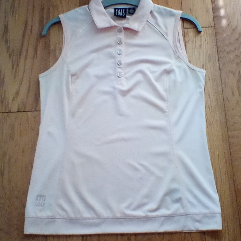 NWOT Kate Lord ladies golf shirt size small. Peach color.